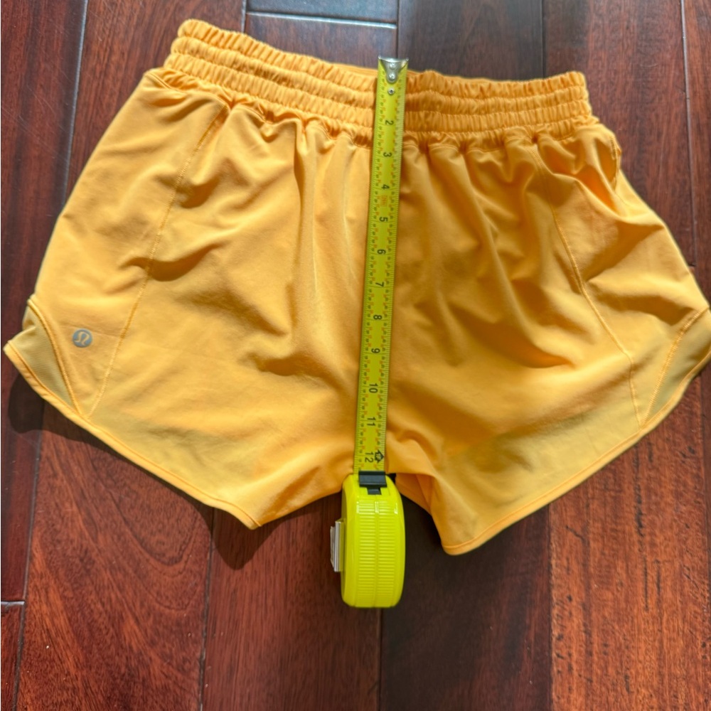 Selling Lululemon shorts size 6 in orange color - Picture 5 of 9